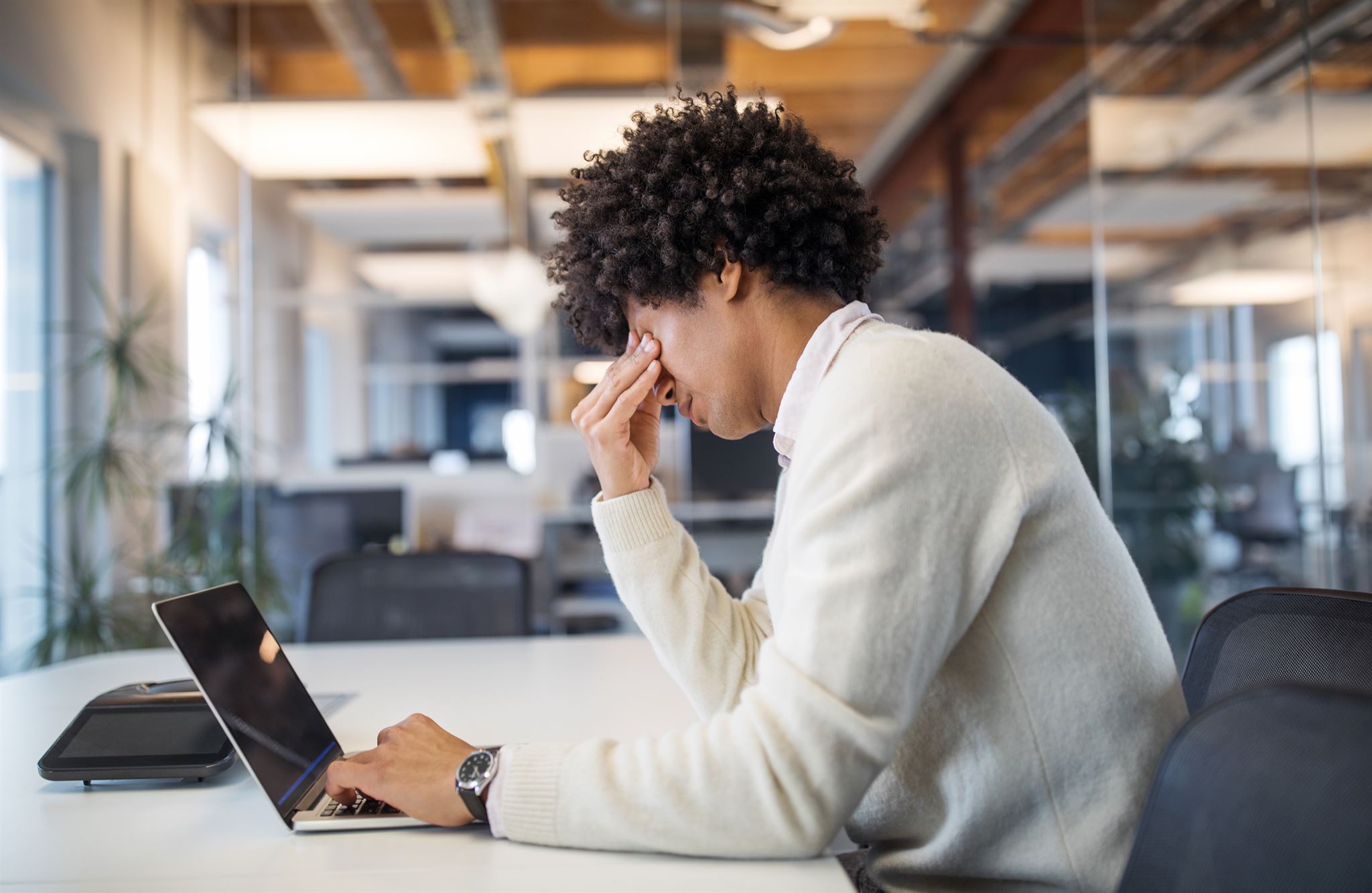 Person using laptop to schedule a demo